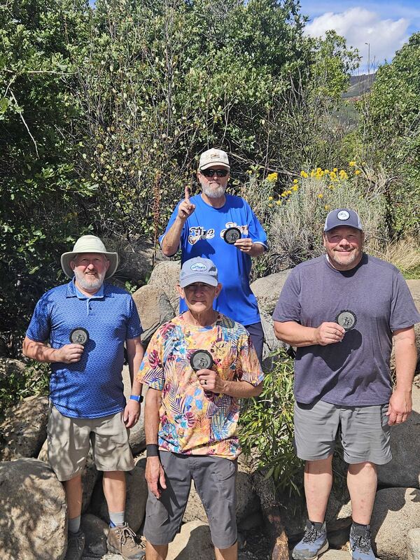 MA50 podium, Christian Phelps, Robert Bumgarner and Bill Johnson, with MA70 champion Charley Quinn